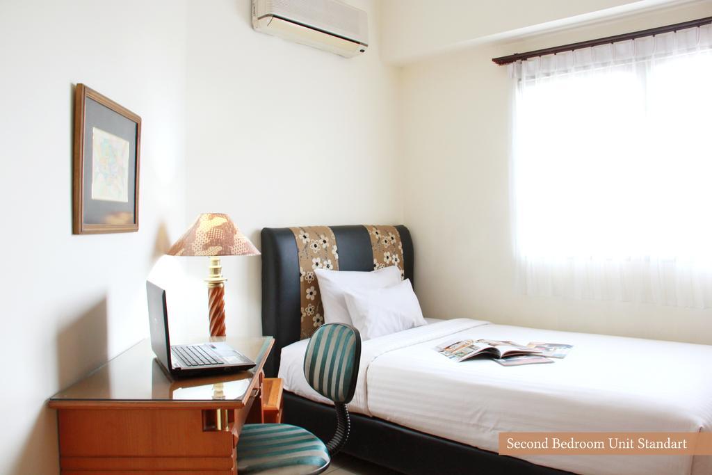 Apartemen Puncak Marina Surabaya Exterior foto